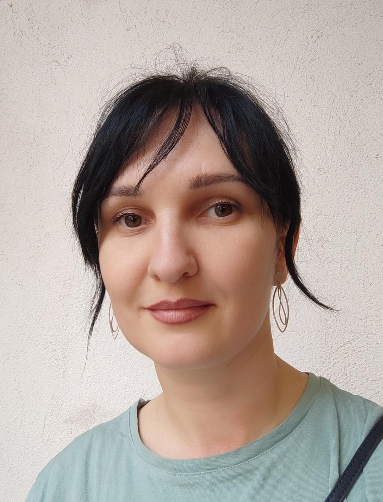 OLGA MUZALAK
